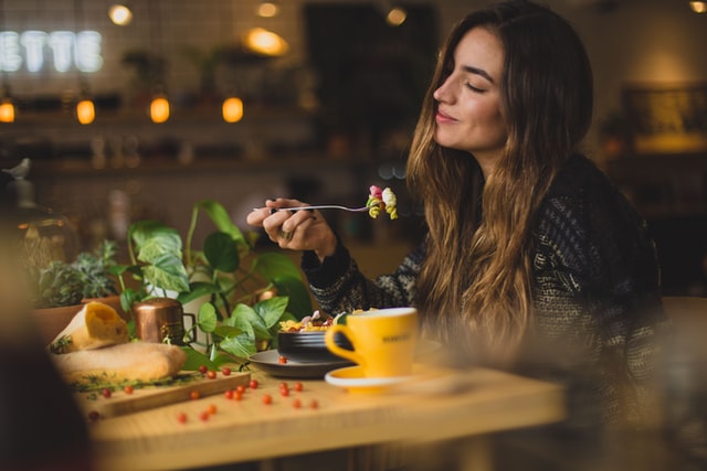 woman eating a balanced meal