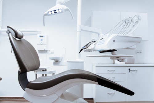 Inside the surgery room of Glasgow dentist with chair and lighting equipment